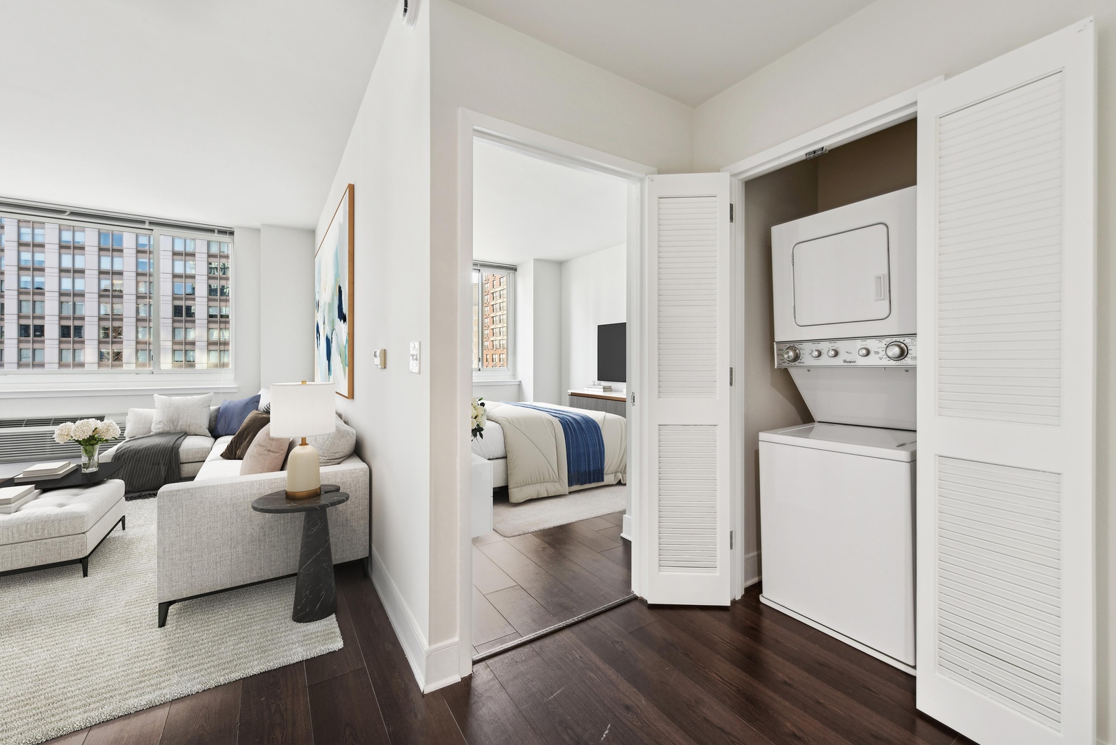 View of bedroom and in-unit laundry